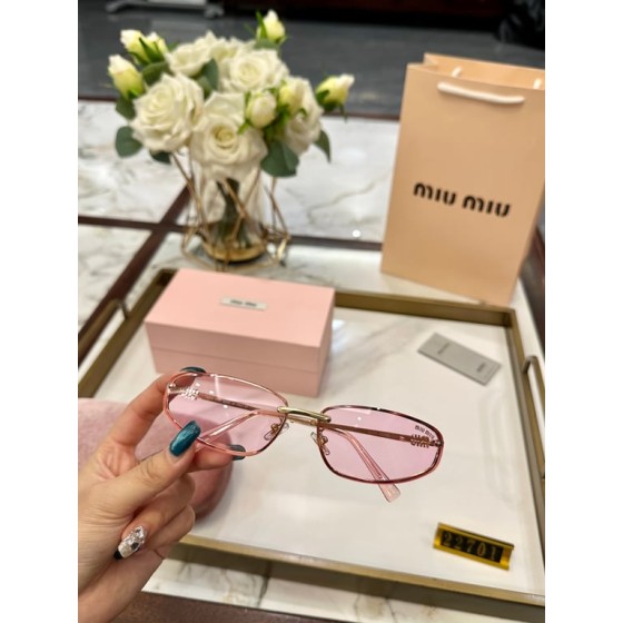 Miu Miu Pink Tinted Sunglasses with Gold Frame